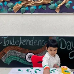 A student in a traditional kurta participates in our Independence Day craft session. Our activities are designed to be inclusive and to celebrate our shared heritage.