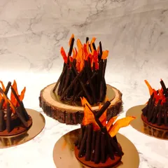 Another view of the Lohri bonfire cakes, showing the detail and consistency across multiple mini cakes for a festive event.