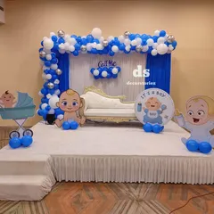 The same Baptism stage setup with a sofa for seating, perfect for photos with family and friends during the ceremony.