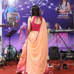 A view from the stage before the event began. This image shows the "Shakti Raas Utsav" banner, with my name as the organizer, highlighting my central role in bringing this vision to life.