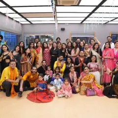 A memorable group photo from a packed Dandiya session at 21 Fitness, Vasant Kunj. It's amazing to see so many people, including children, come together to celebrate and dance.