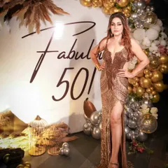 Fifty and fabulous! We loved creating this glamorous setup for a milestone 50th birthday. The combination of a golden sequin gown and our custom "Fabulous 50" backdrop with gold and silver balloons made for truly stunning photos.
