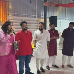 Interacting with participants on stage during the Vyapar corporate party. I make sure to give everyone their moment in the spotlight, creating a fun and inclusive atmosphere.