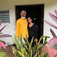 Standing with my guru outside the Yogadhama. Completing my Level 3 training was an intense and transformative journey that taught me the true meaning of self-love through discipline and growth.