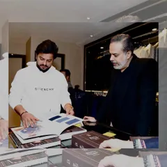 Here I am with Suresh Raina, going through the fabric books. This is the collaborative part of the bespoke process that I enjoy the most, helping a client find the perfect material.