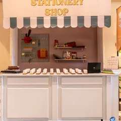 To celebrate a 25th anniversary, we took the couple and their guests back in time with a 'Back to School' theme. The welcome desk was a nostalgic stationery shop where guests collected their custom-made school IDs for the event.