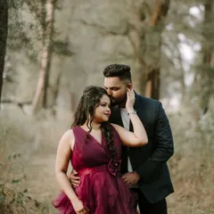 A tender kiss on the forehead in a beautiful forest setting. These are the quiet, romantic moments I love to capture.