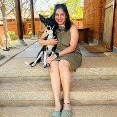 Here I am with Mishti on her fourth birthday. She is more than just a pet; she is my teacher, my muse, and the reason I do what I do.