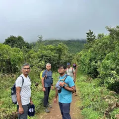 On the trail to Thadiyandamol, walking through the lush green paths of the Western Ghats.