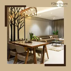 A contemporary living and dining area with a unique tree-motif partition that adds an artistic touch. The space combines a marble-top dining table with a comfortable leather sofa for a cohesive look.