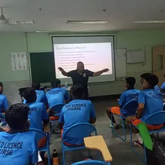 A classroom session for our coaches during an AIFF D License course. We invest in our coaches' education to provide the best training for our players.