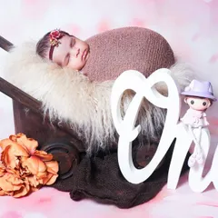 I also offer props for milestone sessions, like this "One" sign used for a baby's first birthday photoshoot. Please inquire for details on milestone packages.