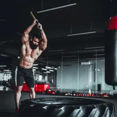 The sledgehammer and tire workout is a powerful tool for developing explosive power, core strength, and cardiovascular endurance. It's a full body challenge.