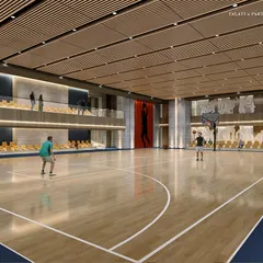 The state-of-the-art basketball court at our Palais Royale sports club. This facility is designed for both intense competition and relaxed fun, featuring high-quality wooden flooring, spectator seating, and dramatic athletic-themed art.