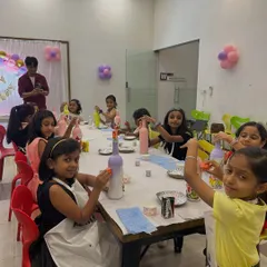 A glimpse into one of our kids' birthday parties. We were hosting a bottle decoupage session, and the children had a wonderful time creating their own unique party favors. It’s a fun, engaging, and mess-free way to celebrate.