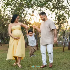Pure joy! Capturing playful, candid moments like this is what makes family maternity shoots so special. Swinging their son between them brought out the biggest smiles from everyone.