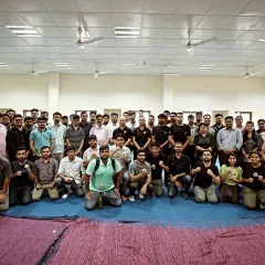 A group photo of participants after a successful mixed-group corporate workshop.