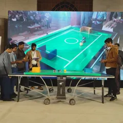 The competition floor at the INNOEX event, with multiple teams and judges present. As a franchisee, your students will have the opportunity to participate in prestigious events like this.