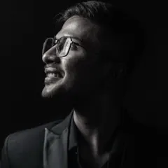 A black and white version of my portrait. The contrast of light and shadow represents the mystery and clarity I strive for in my art.