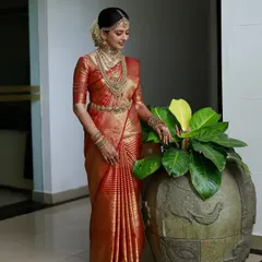 The final look of a perfectly draped Kanchipuram silk saree. The pleats are sharp, the silhouette is elegant, and the bride is ready for her big day.