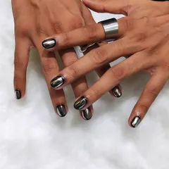Rewriting the rules with these futuristic chrome nails. This metallic silver look is bold, edgy, and perfect for anyone looking to make a statement.