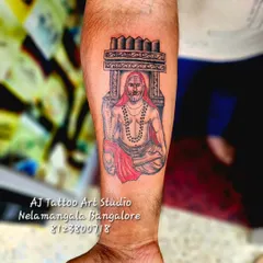 A detailed portrait of Raghavendra Swami, a highly respected Hindu saint. I take care to get the details right for such important spiritual tattoos.
