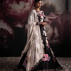 In my fashion realm, each garment becomes a masterpiece. This black floral lehenga is designed to leave a mark on hearts and souls, embodying the essence of pure elegance for a sangeet or reception.