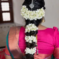 Braid inspiration. A classic, thick South Indian style braid adorned with fresh jasmine flowers (gajra).