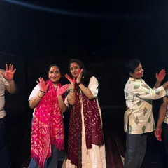Our adult students having a blast during our Holi celebration, playing with colors and dancing.