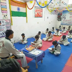 Progress in Taekwondo is not just physical. Here, our students are taking the written exam portion of their belt upgrading test, showing their knowledge of the art's principles and history.
