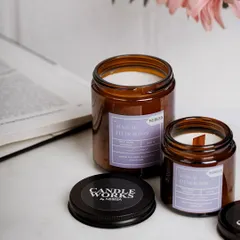 My "Sensual Fleur Bloom" candle is a luxurious floral fragrance, hand-poured into a classic amber jar with a wooden wick that crackles gently as it burns. It's available in two sizes, perfect for any room.