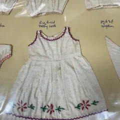 A beautifully embroidered miniature frock from my mother's 1963 journal. Preserving and continuing this legacy of hand skills is my life's work.