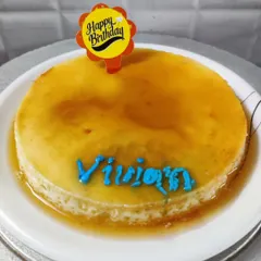 My creamy caramel custard is a simple, no-bake dessert that I can personalize for you. This one was for a birthday, with the name "Vivian" written in blue icing.