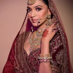 A full view of this modern bridal look, showcasing the harmony between the makeup, henna, and the intricate details of the lehenga. This is the complete vision we teach our artists to create.