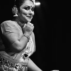 A solo dancer's expressive storytelling, captured in a striking black and white photograph during a performance.