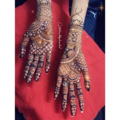 A lovely Indian design with a mix of bold floral patterns on one hand and delicate, intricate work on the other for a unique look.