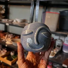 This serene, sculpted face pot has so much personality. It's a wonderful example of how you can bring your ideas to life with clay.