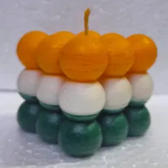 Light up your Independence Day with our Tiranga bubble cube candle. It's a glow of pride, unity, and celebration, with each layer representing the colors of our flag.
