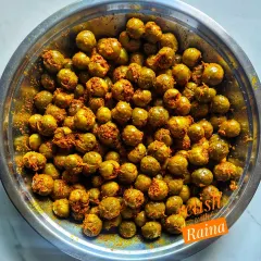 This is my Stuffed Gunda Pickle, also known as Lehsua ka Achaar. Gunda is a sticky berry available only for a short time in the summer. I remove the seed and fill it with a stuffing of grated kairi and masala, a traditional method from Rajasthan and Gujarat.