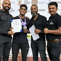 Another champion from our club holding his certificate and medal at the Kerala Nationals 2024. His hard work and dedication paid off.