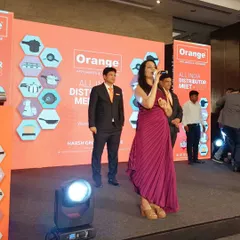 On stage for the Orange Cookware dealers meet. I work closely with the brand's leadership to ensure the event flow is smooth, from welcoming dealers to announcing awards and keeping the energy high throughout the day.