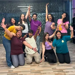 This is my VibeTribe. More than just a studio, I've built a community where dancers come together, support each other, and just have a great time. This is the energy you walk into every single day.