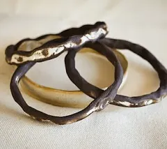 Beautiful, rustic ceramic bangles made in our jewelry workshop. Wearable art!