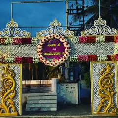 Another example of a grand entrance gate decoration. The personalized floral wreaths welcome the guests to the celebration.