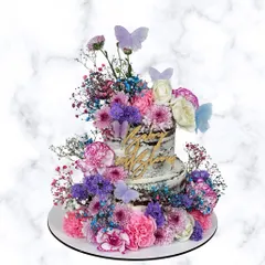 A true garden on a cake. This two-tiered semi-naked cake is overflowing with a vibrant mix of fresh flowers and delicate butterflies for a stunning, natural look.