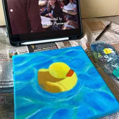 My ideal painting setup: a work-in-progress on the easel, my paint palette, and a good show playing in the background. This is my happy place.