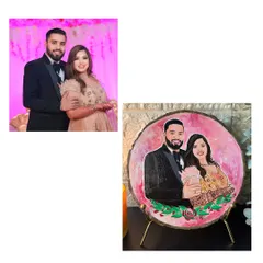 From a photograph to a personalized piece of art. This custom couple portrait on a wood slice features a lovely pink background and a delicate floral border to frame the special memory.
