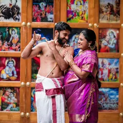 A playful moment during a maternity shoot at a temple, celebrating the couple's journey to parenthood. We focus on capturing the joy and connection between partners as they await their new arrival.