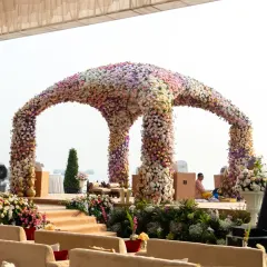 This mandap is a testament to the art of floristry, with thousands of blossoms creating a solid dome of color. It’s a design that makes a bold, romantic statement for a truly memorable wedding ceremony.