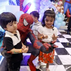 Spider-Man teaches our young guests how to shoot webs. Our character actors are great at interacting with kids and making the fantasy feel real.